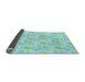 Thickness of Patterned Medium Turquoise Green Rug, pat1277lblu