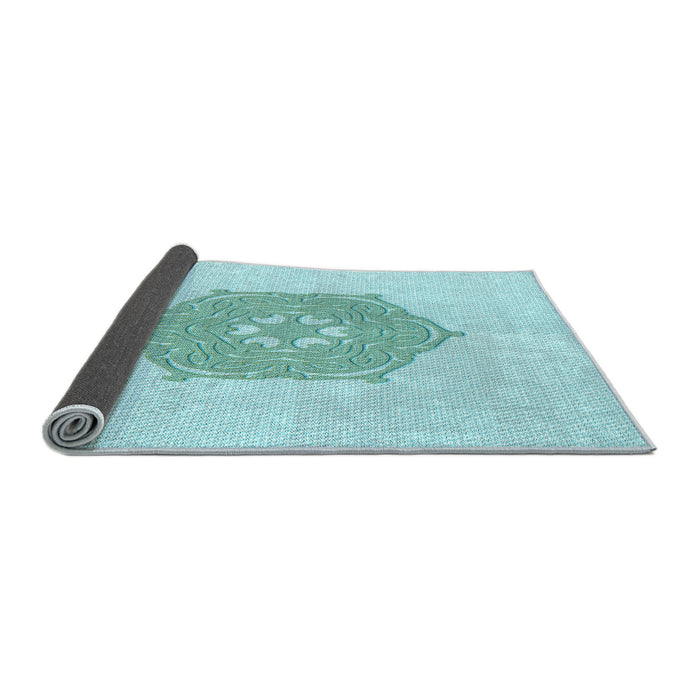 Thickness of Patterned Medium Turquoise Green Rug, pat2558lblu